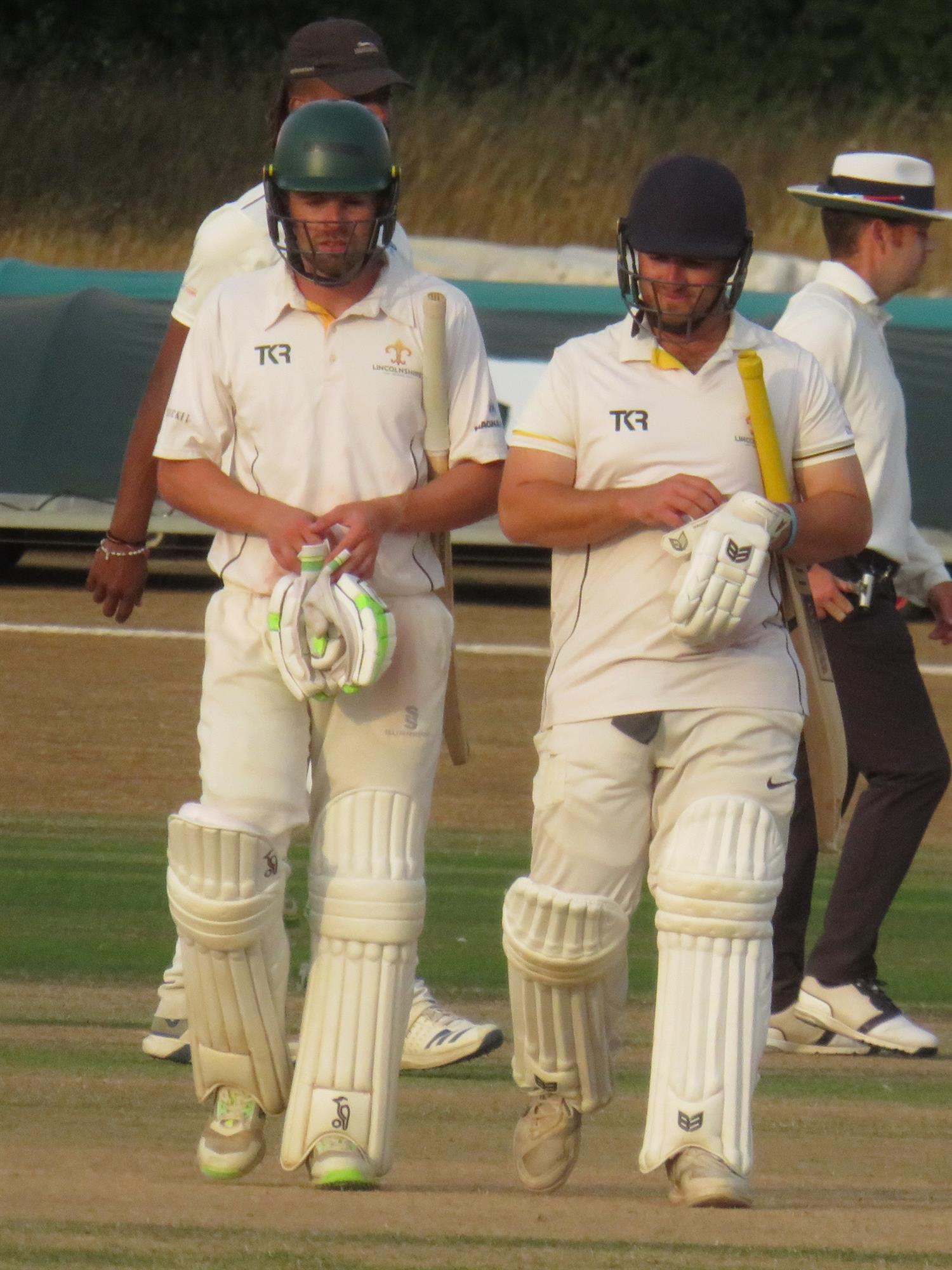 Bedfordshire v Lincolnshire, NCCA Cluberly Eastern Div 2 match, held at Dunstable Town Cricket Club on 02/08/2026 .
Sam Evans (left) 58 not out and Nic Keast (right) 67 not out leave the field at close of play on day one. 