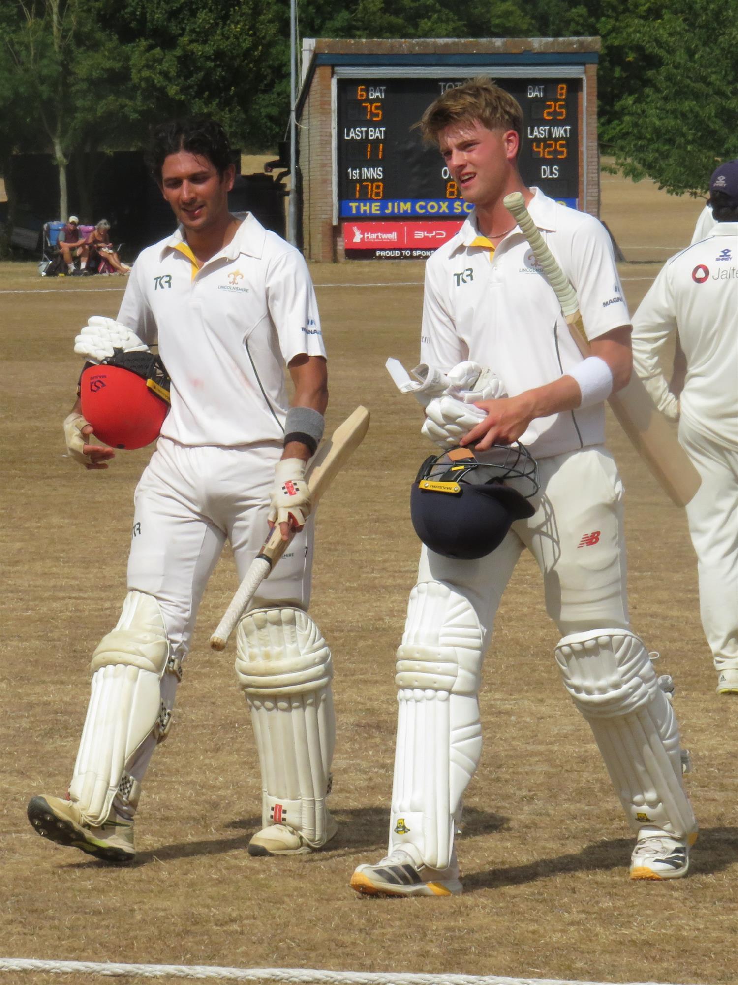 Bedfordshire v Lincolnshire, NCCA Cluberly Eastern Div 2 match, held at Dunstable Town Cricket Club on 02/08/2026 .
Amartya Kaul (left) 75 not out and Tom Currie (right) 25 not out, leave the field at the end of the Lincolnshire first innings. Lincolnshire scored 479 for 6 wickets in their allotted 90 overs.