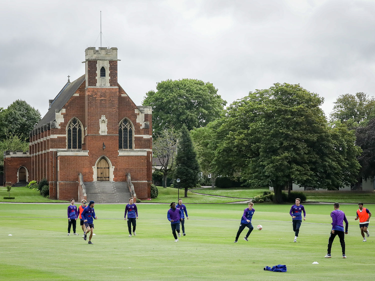 The Bedfordshire squad warming on the first day of the Durant Cricket National Counties Championship match against Northumberland at Bedford School on July 23rd, 2023.