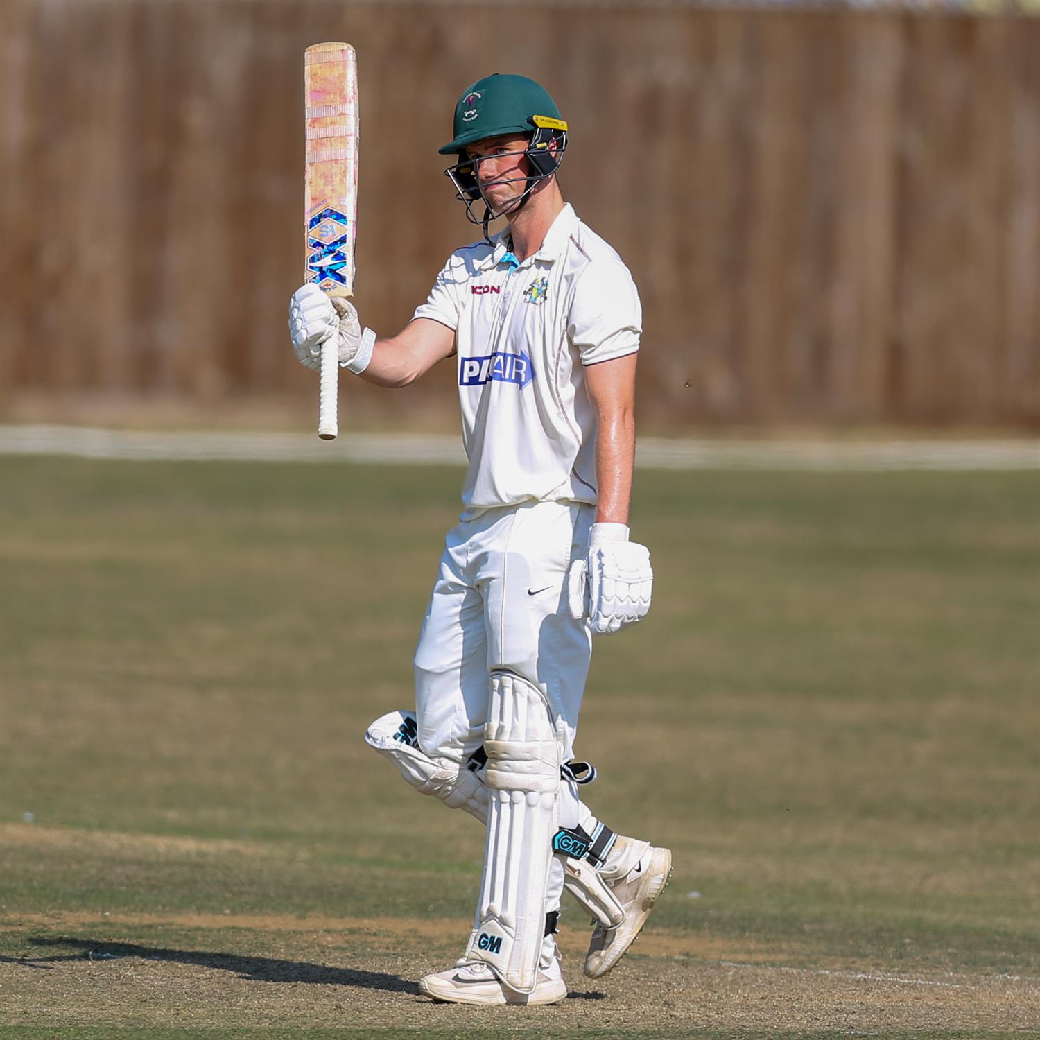 Alex Peirson acknowledges his half century on the way to 122 for Cambridgeshire in the first innings against Buckinghamshire in the NCCA Cluberly Championship, Eastern Division 1 match, held at Chesham CC on 10/08/2025 .