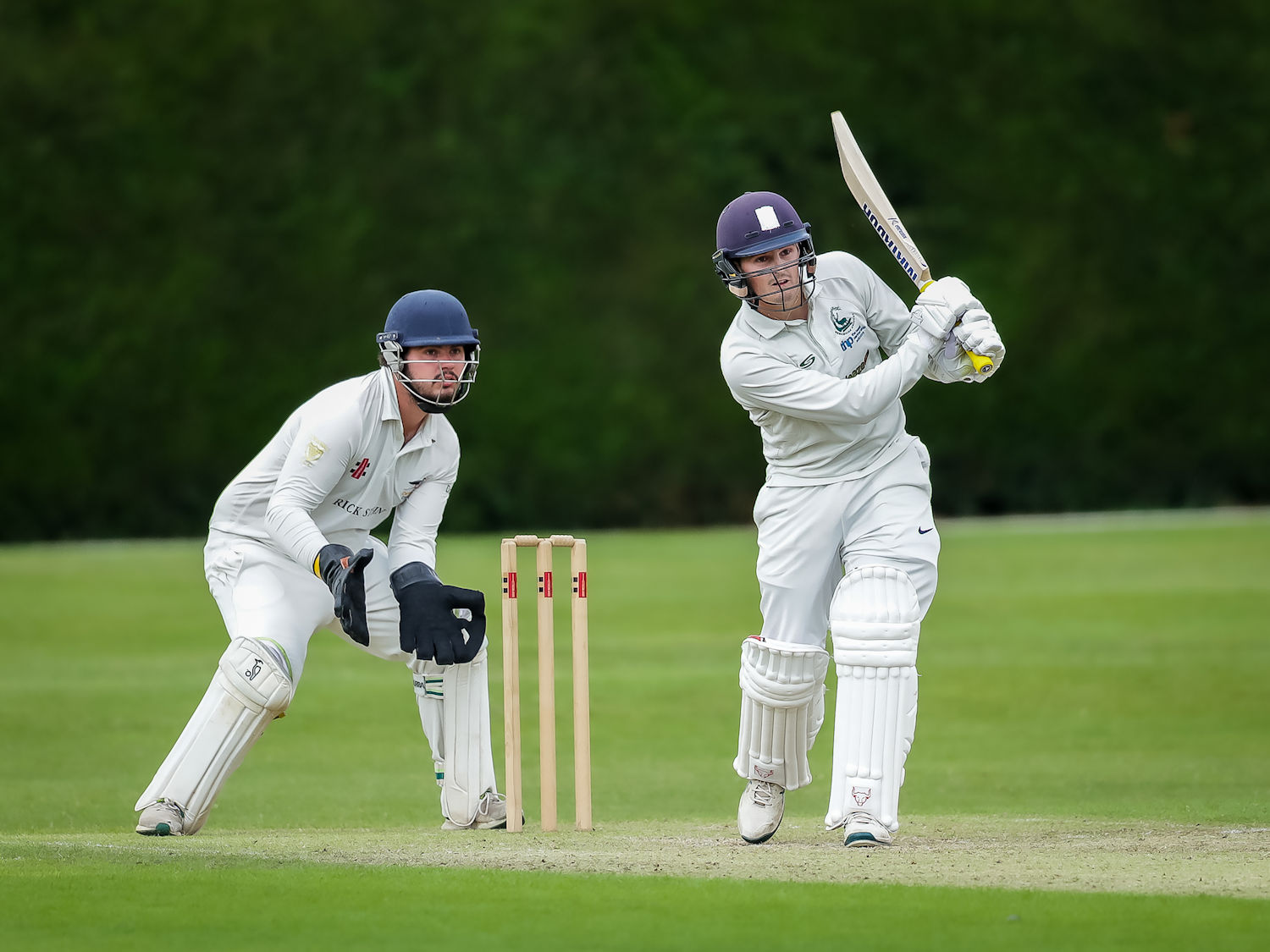 Cornwall's Alex Bone behind the stumps as Berkshire's Rhodri Lewis bats on the first day of the Durant Cricket National Counties Championship match against at Wargrave Cricket Club on July 14th, 2024.