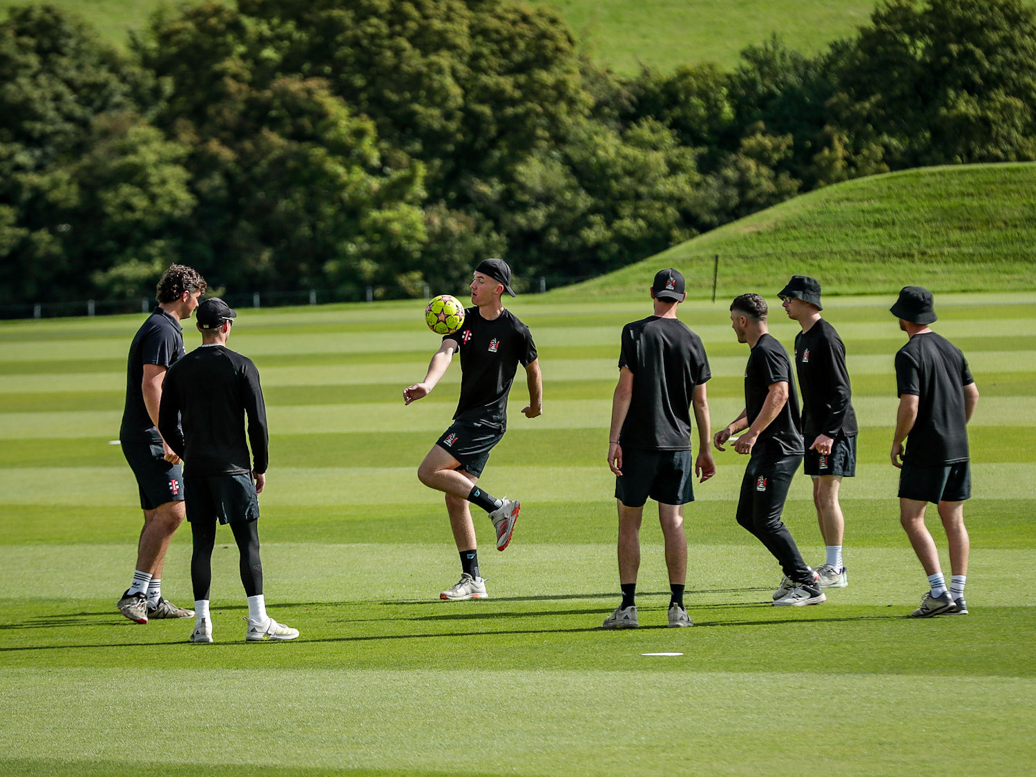 The Cumbria squad warming up for the the NCCA Trophy final against Berkshire at Wormsley Cricket Ground on August 27th, 2023.
