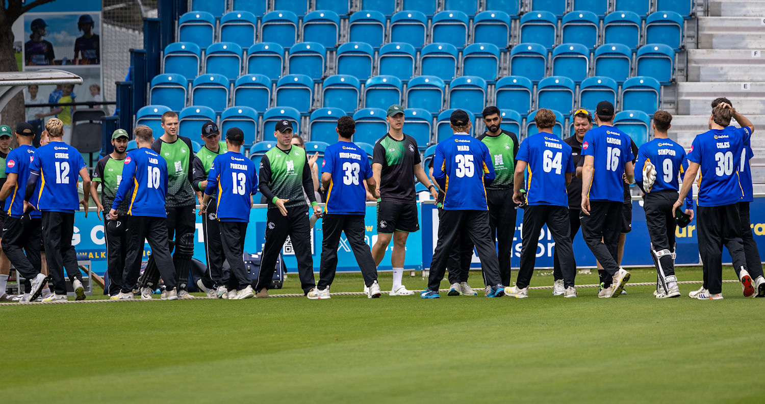 Berkshire and Sussex squads shake hands at the conclusion of the NCCA Showcase game at The 1st Central County Ground on May 28th, 2025.