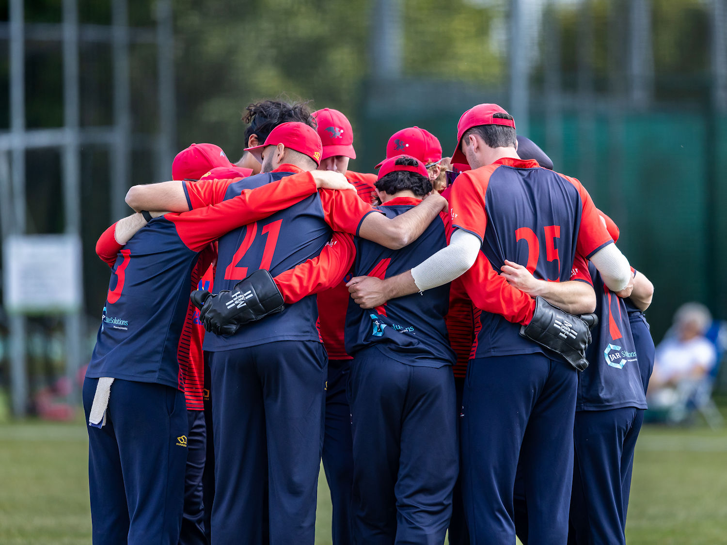 Wales NC squad huddle at the NCCA T20 match against Berkshire at Wargrave Cricket Club on June 15th, 2025.