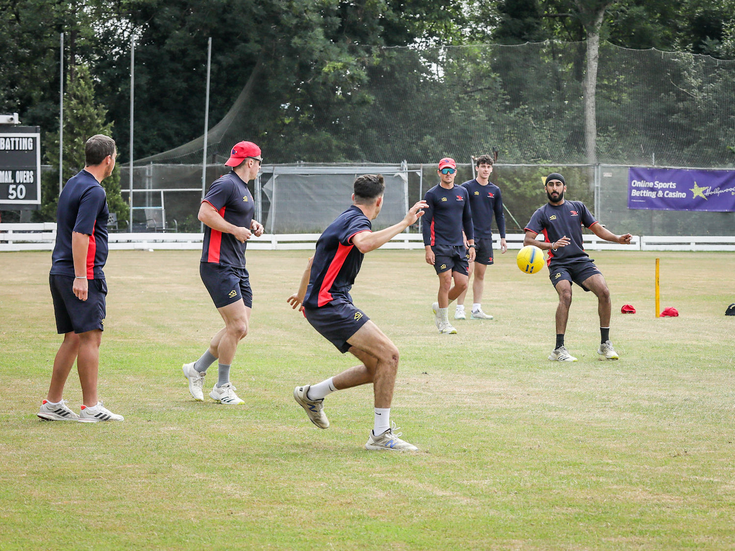 The Wales NC squad warming up with a game of football ahead of the NCCA Trophy match against Dorset at Panteg Cricket Club on June 18th, 2023.