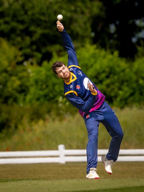 Oxfordshire's Tom Hinley bowling in the first of two NCCA Dojo T20 matches against Wales NC at Challow & Childrey Cricket Club on May 31st, 2026. 