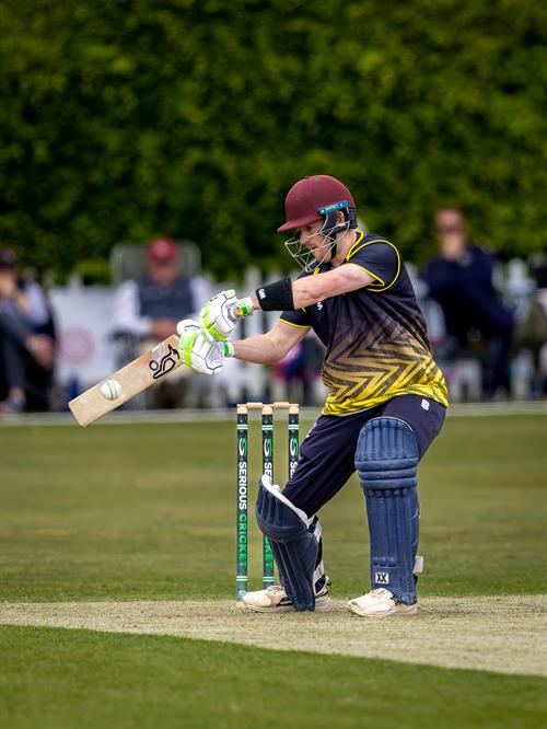 Alfie Cooper reached his half century from 50 balls for Norfolk in the NCCA NV Play Trophy match against Lincolnshire at Woodhall Spa Cricket Club on May 10th, 2026.