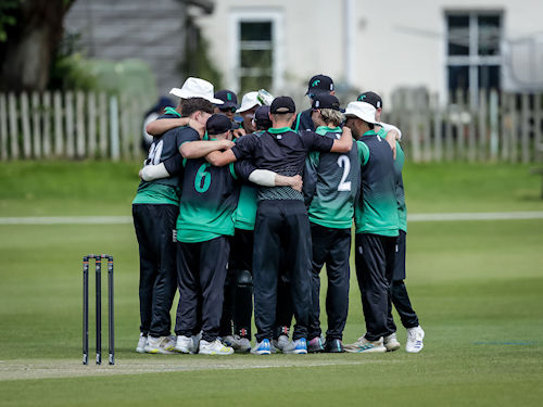 Dorset team huddle during the NCCA Trophy match against Wales NC at Wimborne Cricket Club on June 9th, 2024.  